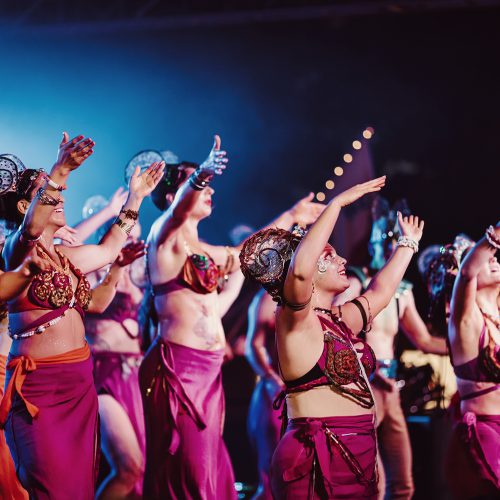 Female dancers performing in the evening