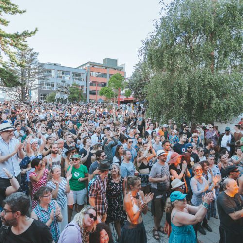 Large crowd at glover park stage clapping