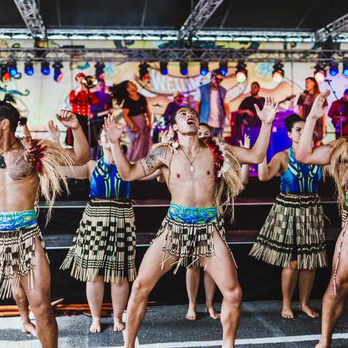 Men and women doing a traditional Pasifika dance on the CubaDupa's Swan stage